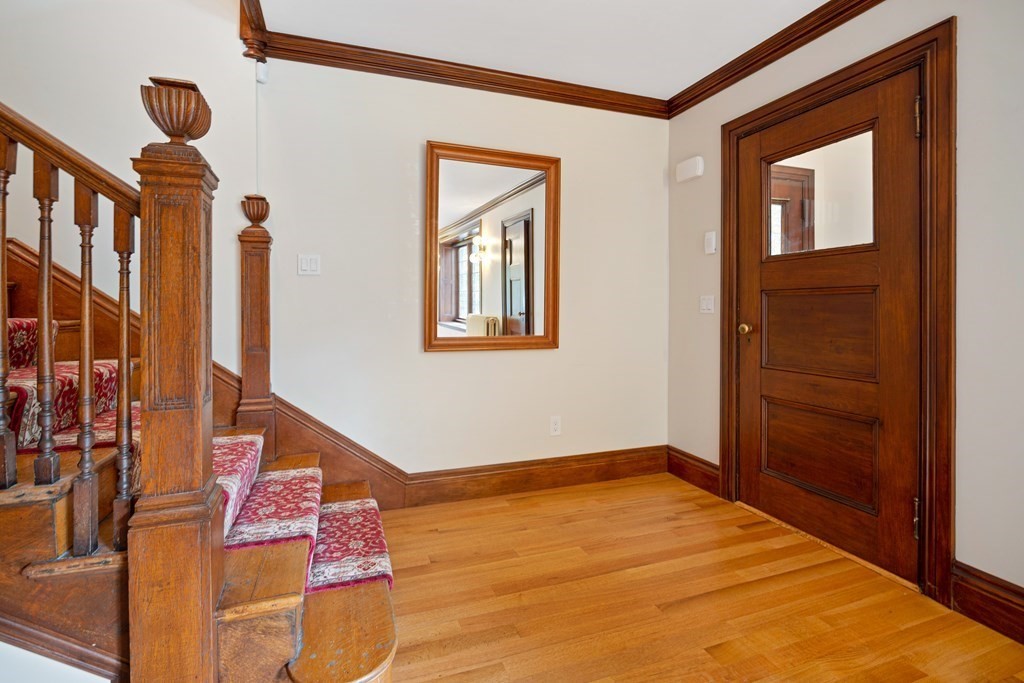 157 Winthrop Road, Unit 1 Brookline, MA 02445 - Photo 31 of 36 a view of an entryway with wooden floor