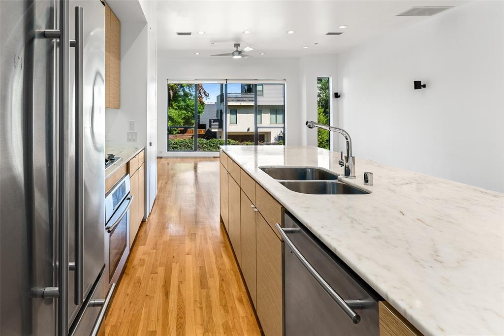 1505 North Haskell Avenue, Unit 5 Dallas, TX 75204 - Photo 15 of 40 a view of a kitchen cabinets a sink and dishwasher