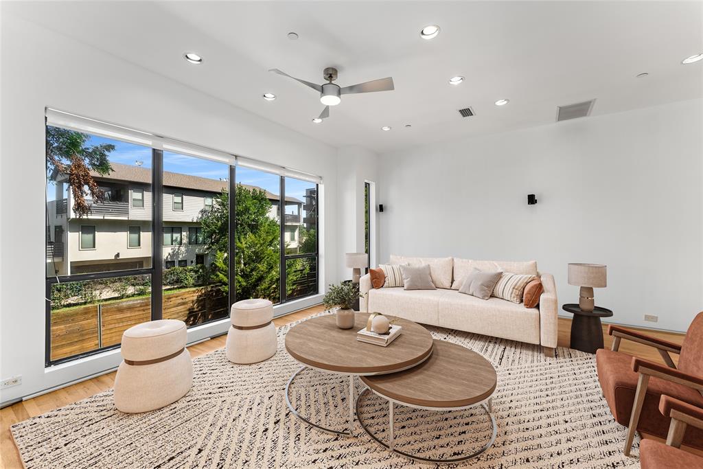 1505 North Haskell Avenue, Unit 5 Dallas, TX 75204 - Photo 6 of 40 a living room with furniture and a large window