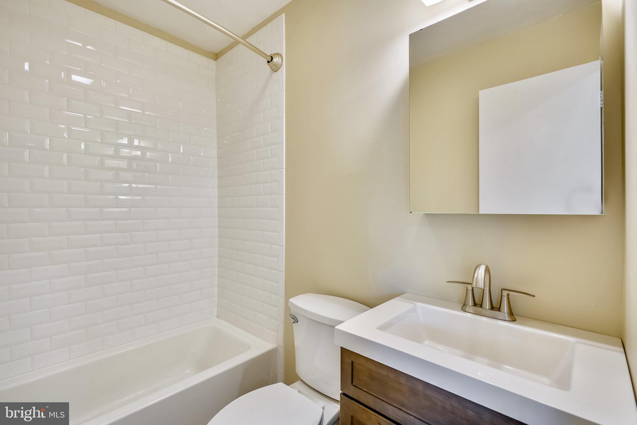 2202 Notely Lane Crofton, MD 21114 - Photo 18 of 27 Renovated master bath with subway tile shower