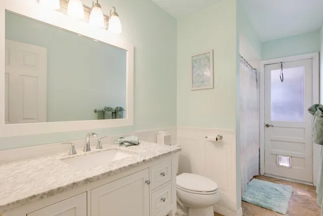 a building outdoor space with patio furniture and potted plants