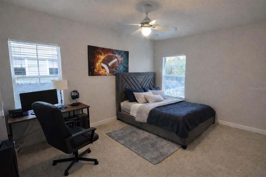 1007 Bennett Road Orlando, FL 32814 - Photo 19 of 25 a bedroom with furniture and a window