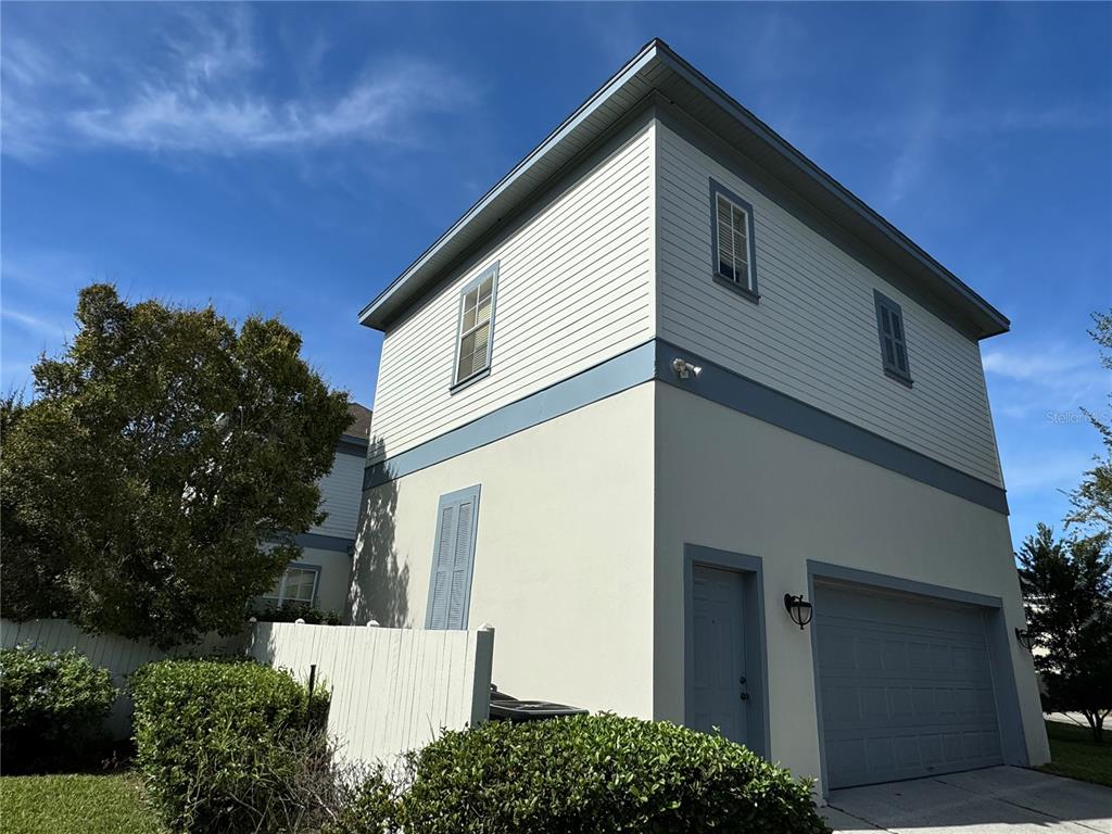 1007 Bennett Road Orlando, FL 32814 - Photo 2 of 6 a view of a house with a yard