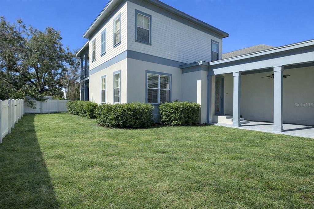 1007 Bennett Road Orlando, FL 32814 - Photo 2 of 25 a front view of a house with a yard