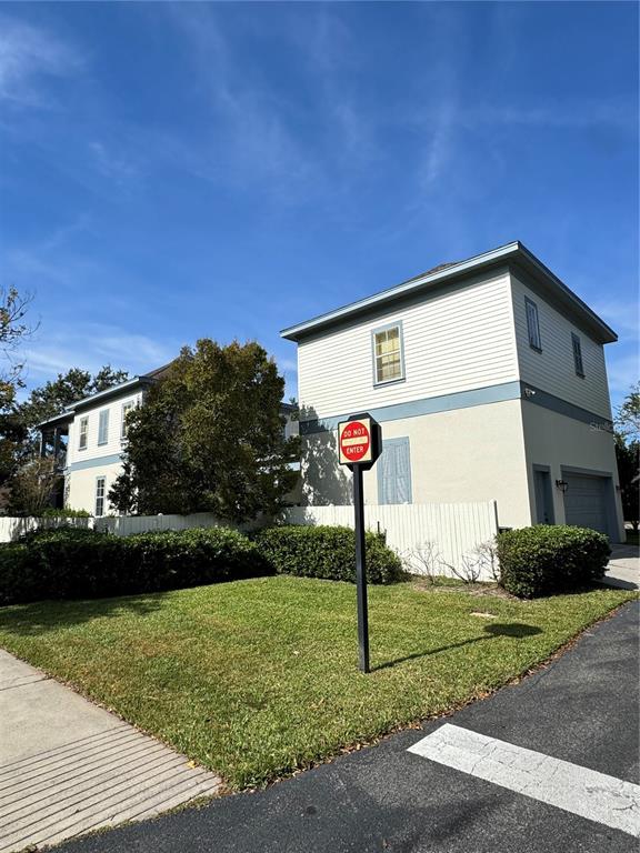 1007 Bennett Road Orlando, FL 32814 - Photo 3 of 6 a front view of a house with garden