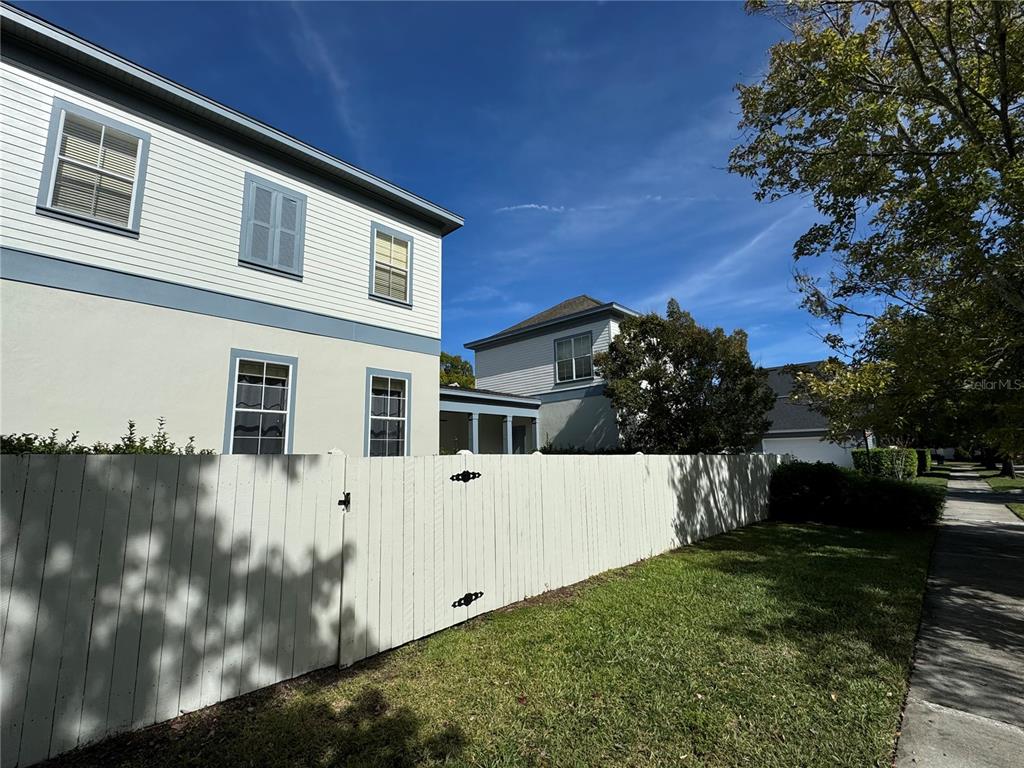 1007 Bennett Road Orlando, FL 32814 - Photo 4 of 6 a front view of a house with garden