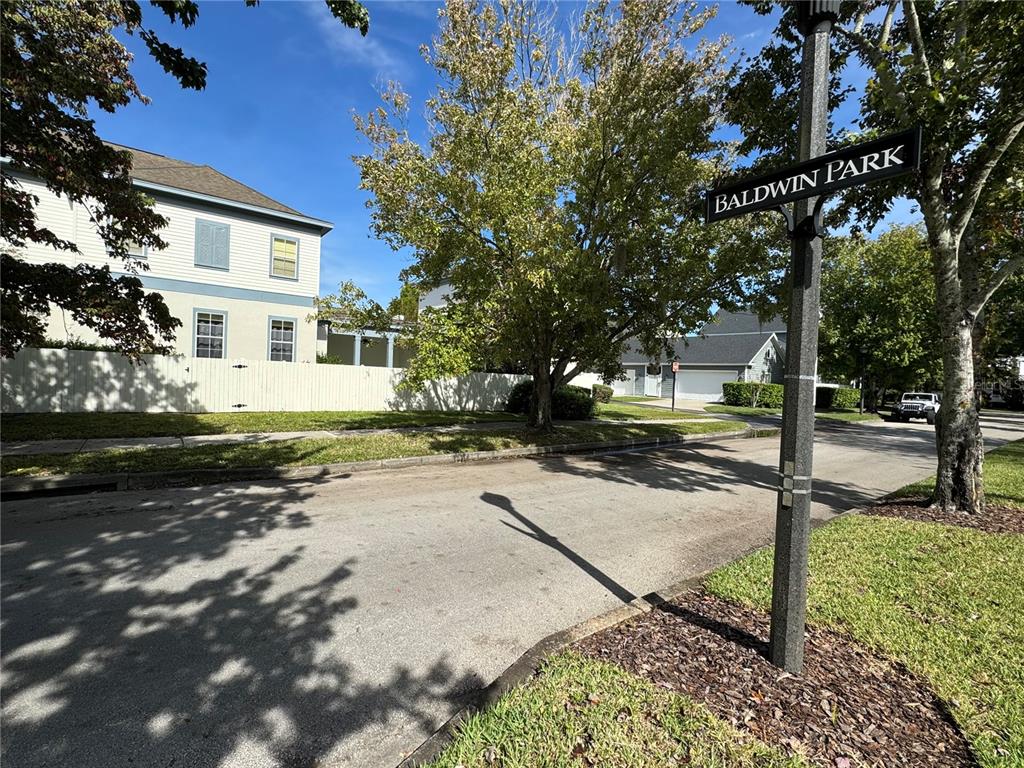 1007 Bennett Road Orlando, FL 32814 - Photo 5 of 6 a view of a street with large tree
