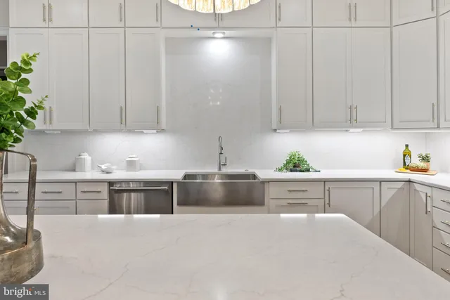 a view of a room with cabinets and window