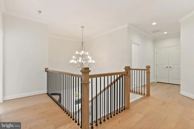 a view of an empty room with closet area