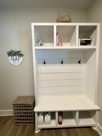 a living room with furniture and a rug