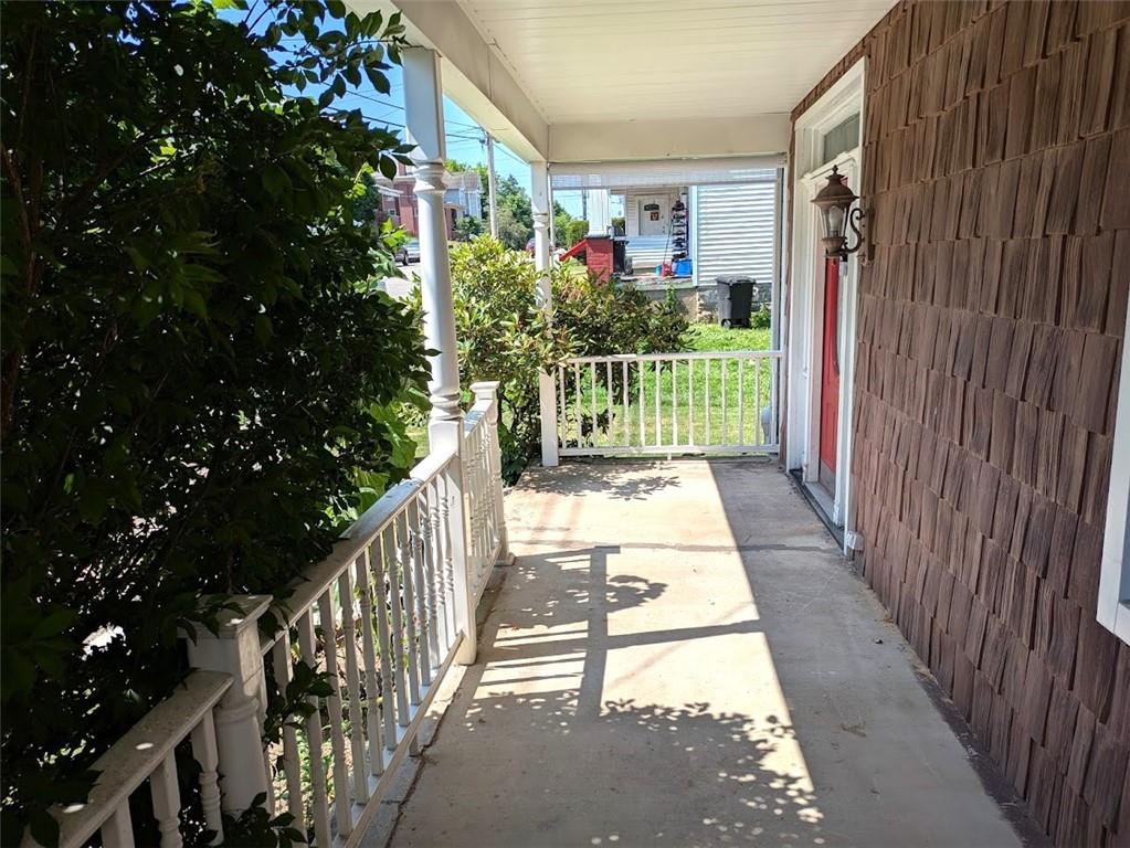 413 North 3rd Street Jeannette, PA 15644 - Photo 2 of 38 a view of a pathway of a house with a porch