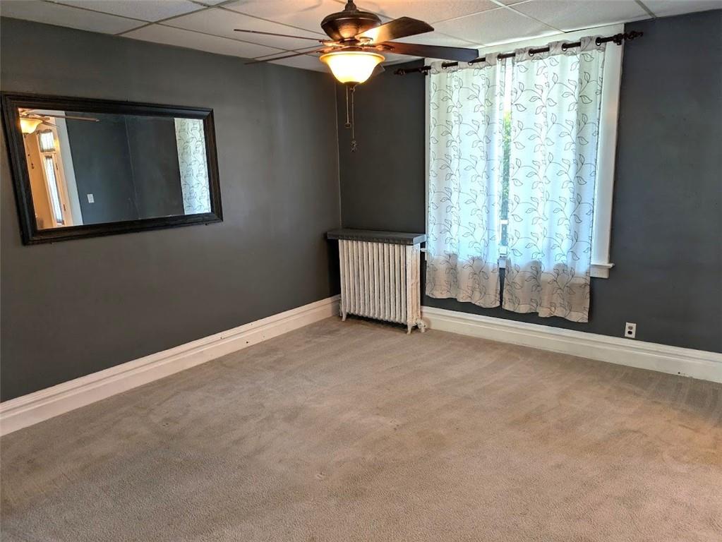 413 North 3rd Street Jeannette, PA 15644 - Photo 7 of 38 a view of room with window and ceiling fan