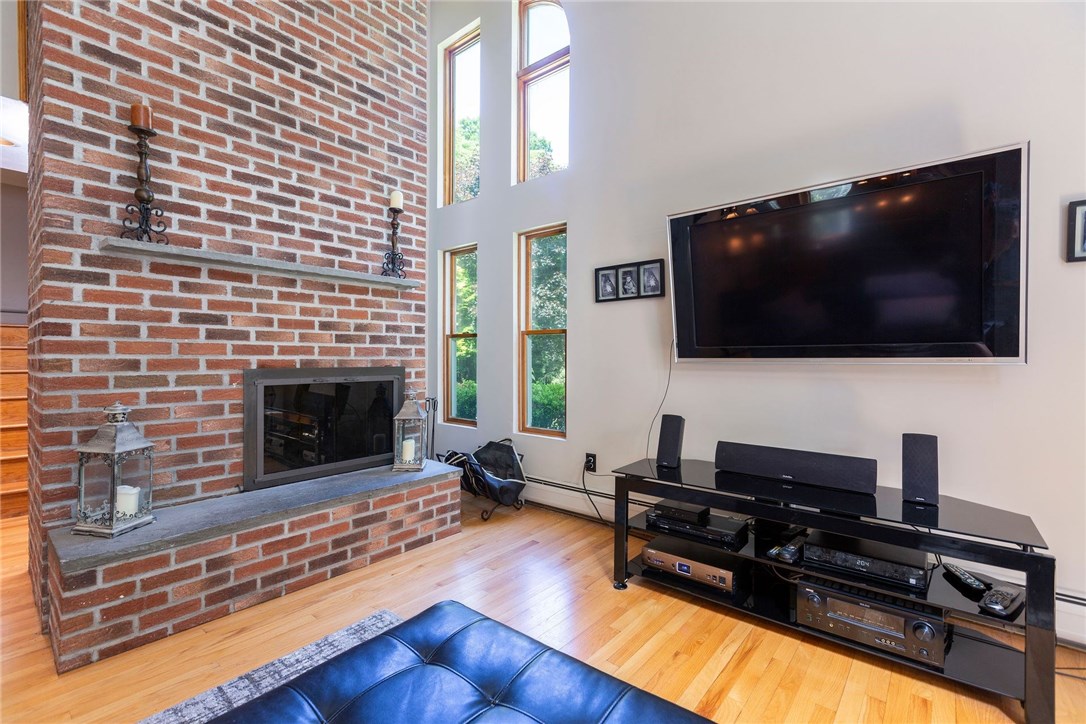 237 Weaver Hill Road Coventry, RI 02816 - Photo 21 of 39 Gorgeous brick fireplace!