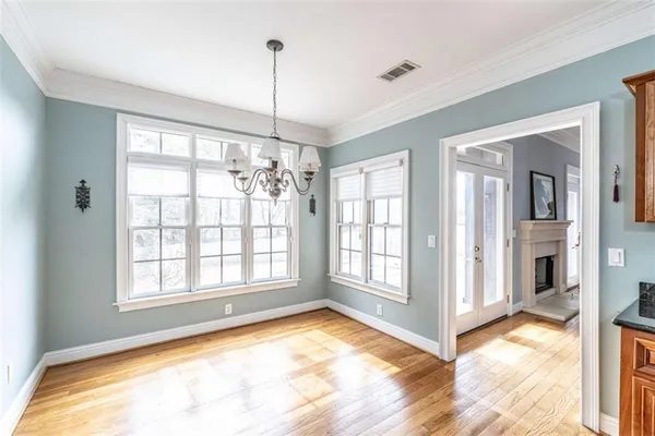 a view of an empty room and window