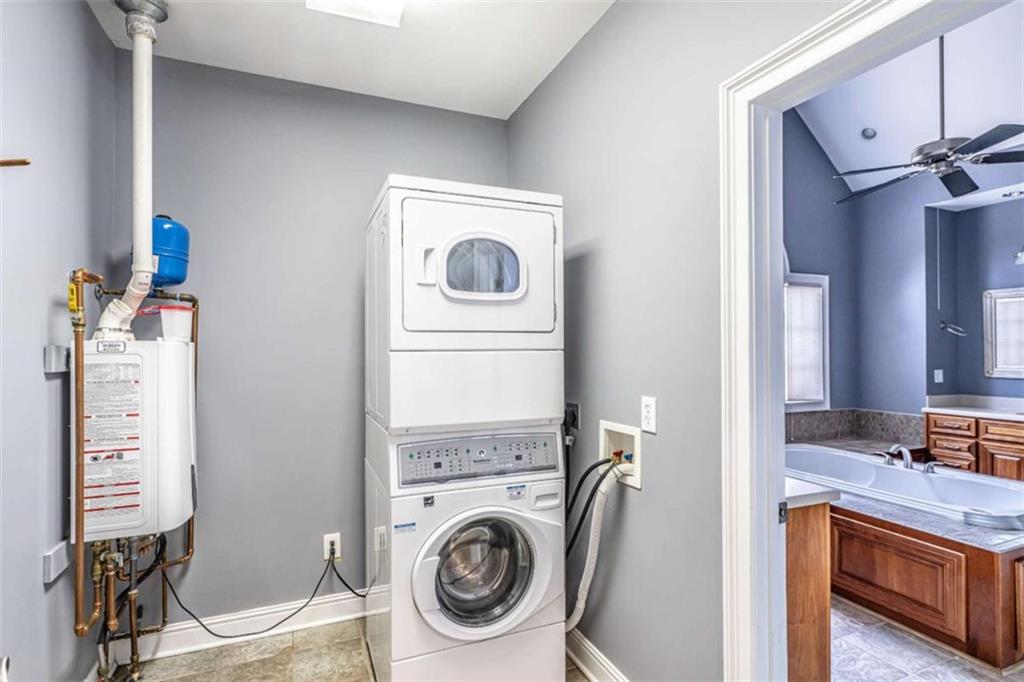 4 Bridgeview Drive Southeast Rome, GA 30161 - Photo 25 of 42 a view of a storage and utility room with washer and dryer