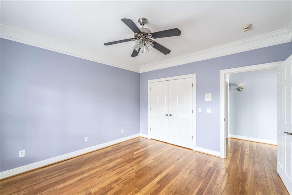 4 Bridgeview Drive Southeast Rome, GA 30161 - Photo 31 of 42 a view of a room with wooden floor and ceiling fan