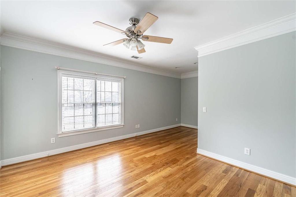 4 Bridgeview Drive Southeast Rome, GA 30161 - Photo 32 of 42 a view of an empty room with wooden floor and a window