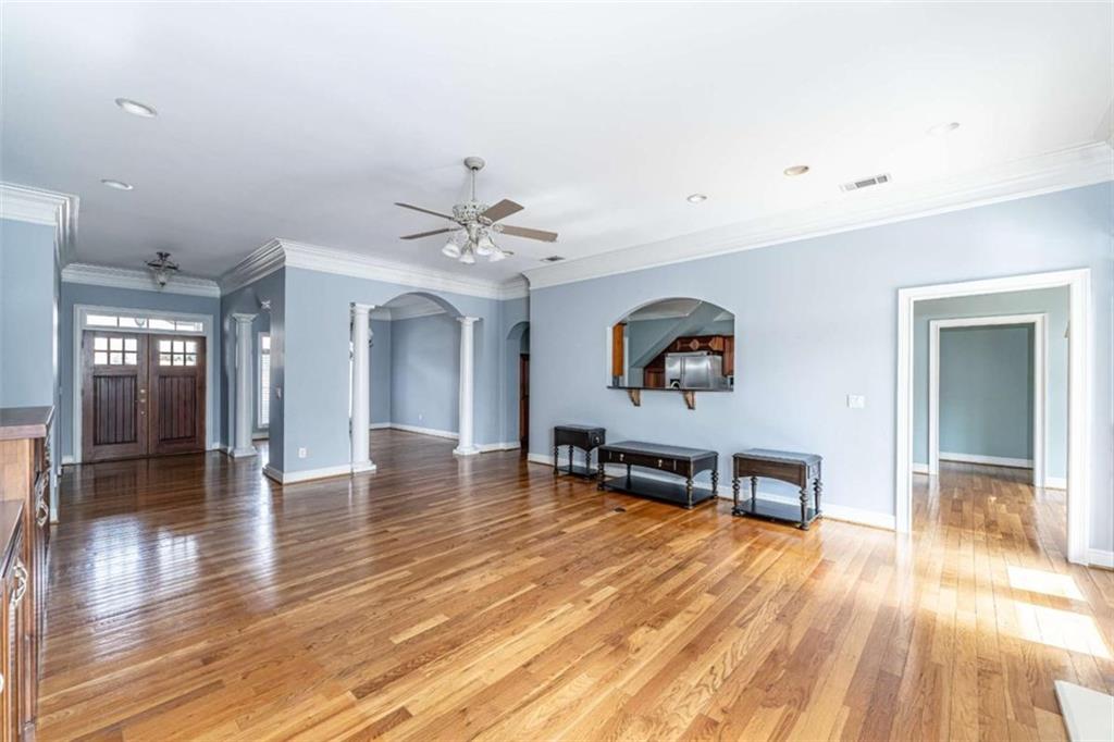 4 Bridgeview Drive Southeast Rome, GA 30161 - Photo 6 of 42 a view of a livingroom with furniture wooden floor and a ceiling fan