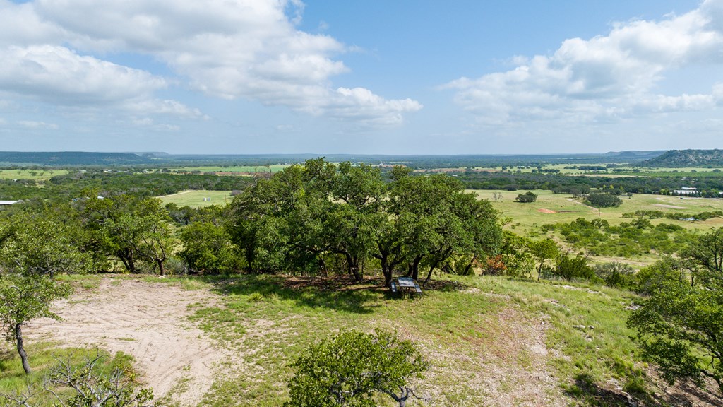 0 Doss-Spring Creek Road Doss, TX 78618 - Photo 2 of 18 a view of a lake with a yard