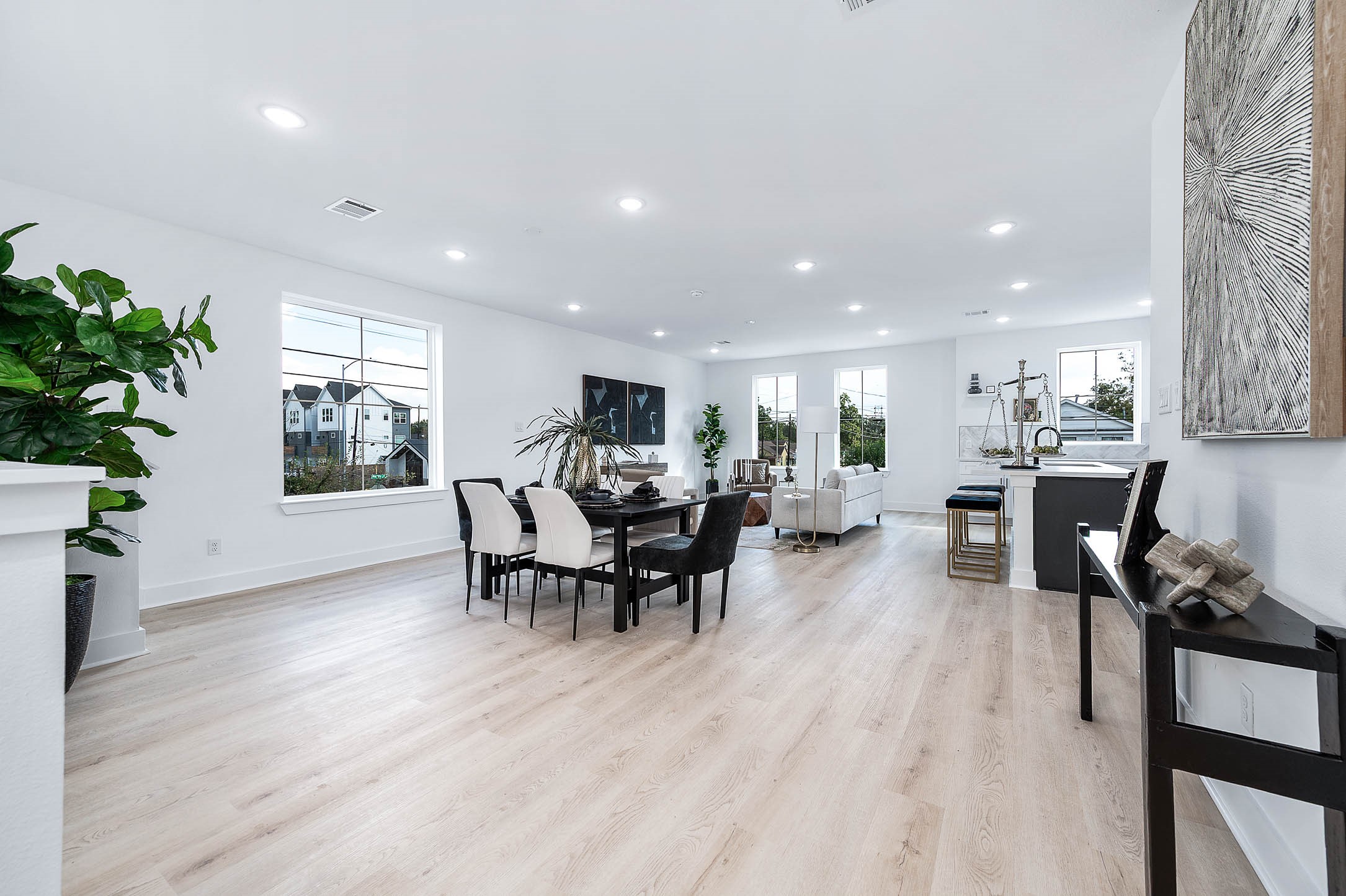 1515 Euel Street Houston, TX 77009 - Photo 8 of 34 Open-concept living and dining area filled with natural light, creating an airy and comfortable space perfect for everyday living and entertaining.