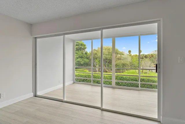 a view of a room with a large window