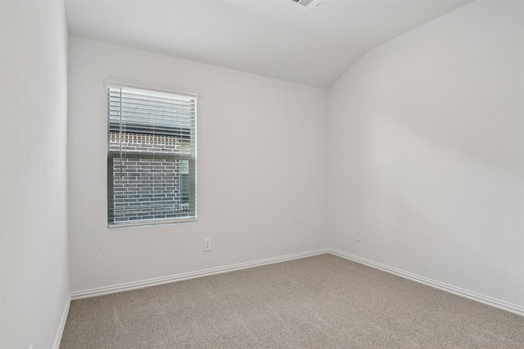 2203 Rannoch Street Sherman, TX 75092 - Photo 22 of 37 an empty room with a window