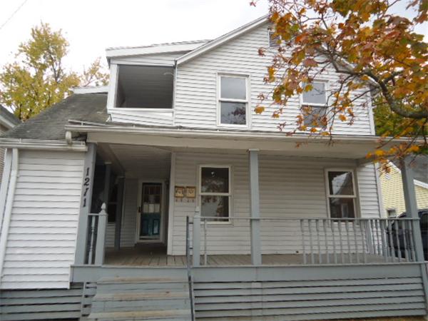 1271 Worcester Street Springfield, MA 01151 - Photo 1 of 16 a view of a house with a large windows