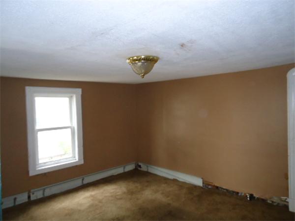 1271 Worcester Street Springfield, MA 01151 - Photo 6 of 16 an empty room with a window