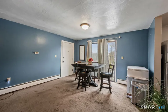 a view of a livingroom with furniture