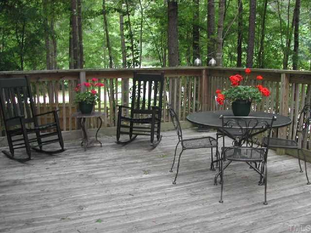 102 Chevron Circle Cary, NC 27513 - Photo 11 of 12 Extra large deck looking out into private wooded and fenced back yard!