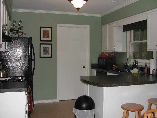 102 Chevron Circle Cary, NC 27513 - Photo 6 of 12 All updated appliances, gas range and breakfast bar.