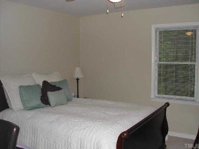 102 Chevron Circle Cary, NC 27513 - Photo 10 of 12 Both secondary bedrooms are large and can be used for multi-purposes.