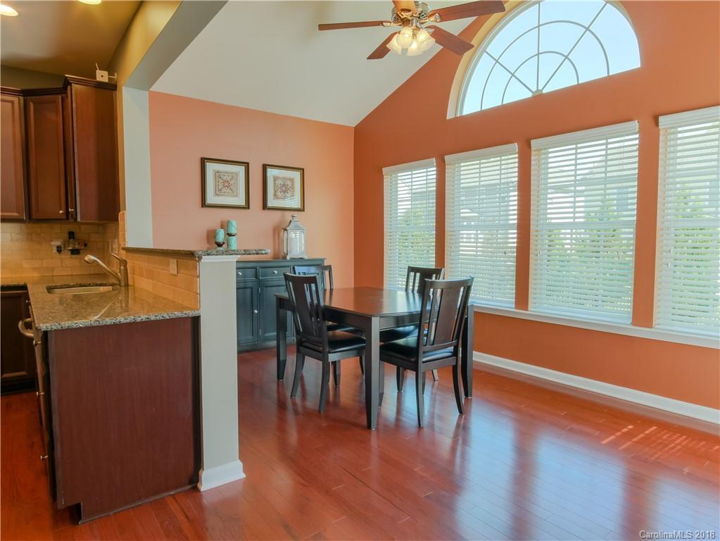 1621 Ridgehaven Road Waxhaw, NC 28173 - Photo 14 of 36 a view of a dining room with furniture window and wooden floor