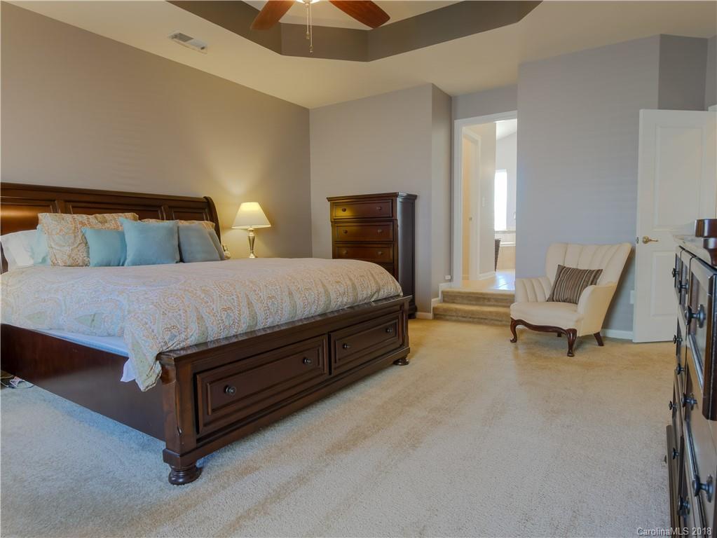 1621 Ridgehaven Road Waxhaw, NC 28173 - Photo 19 of 36 a bedroom with a bed chair and window