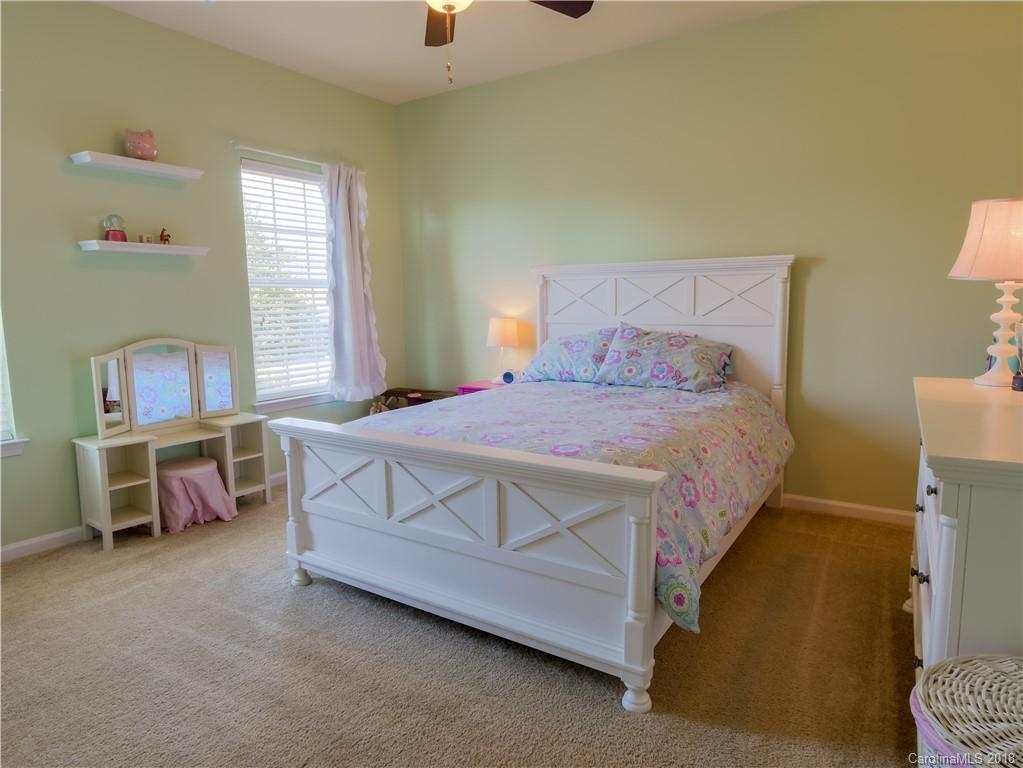 1621 Ridgehaven Road Waxhaw, NC 28173 - Photo 23 of 36 a bedroom with a bed and a window