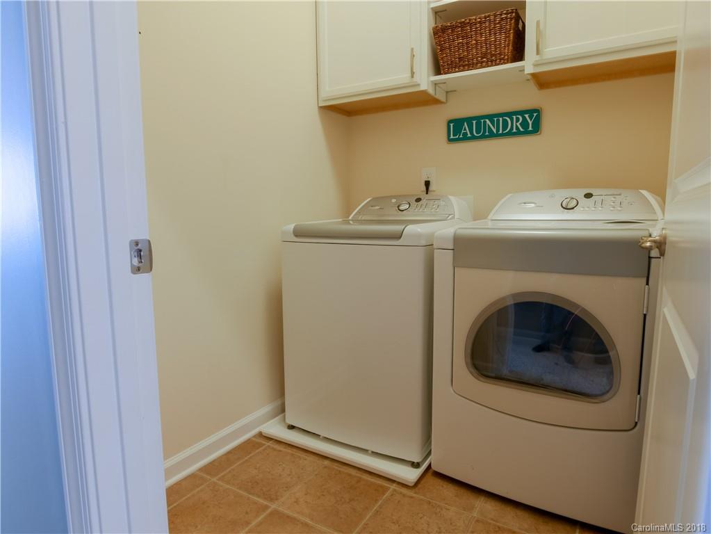 1621 Ridgehaven Road Waxhaw, NC 28173 - Photo 25 of 36 a utility room with dryer and washer