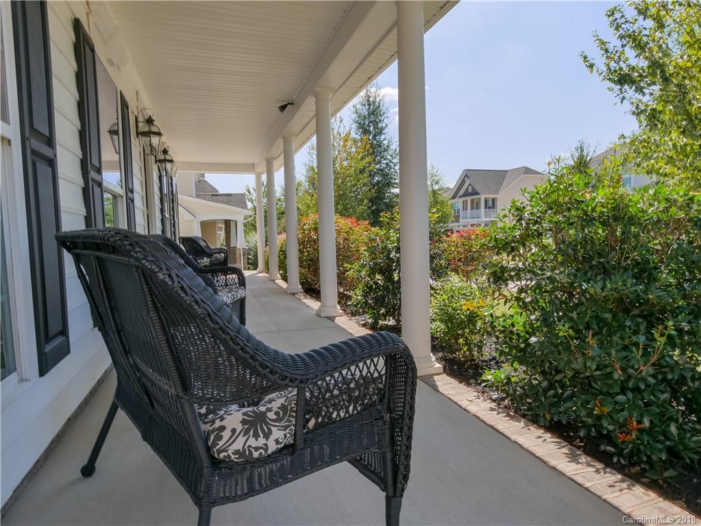 1621 Ridgehaven Road Waxhaw, NC 28173 - Photo 4 of 36 a view of balcony with furniture and garden
