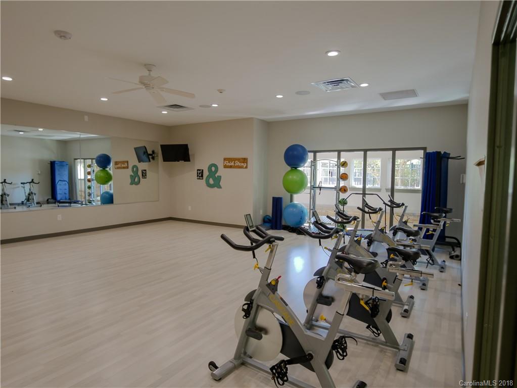 1621 Ridgehaven Road Waxhaw, NC 28173 - Photo 35 of 36 a view of a room with gym equipment