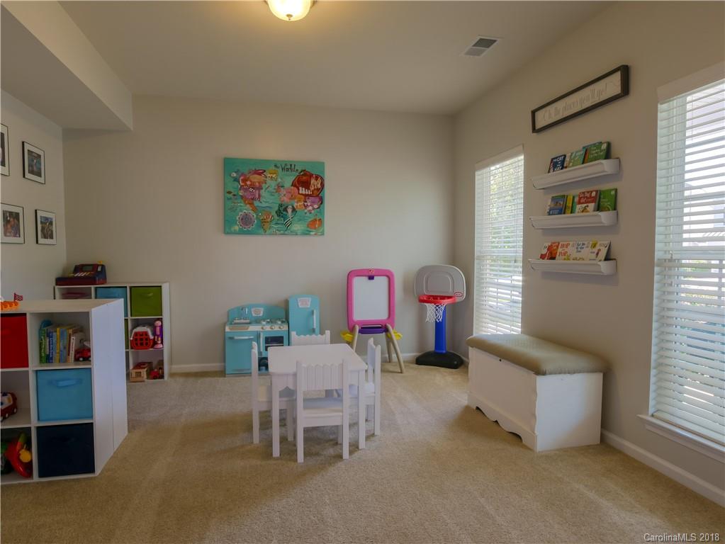 1621 Ridgehaven Road Waxhaw, NC 28173 - Photo 8 of 36 a living room with furniture and a window