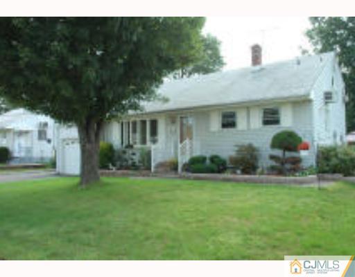 52 Eardley Road Edison, NJ 08817 - Photo 2 of 10 a front view of house with yard and green space