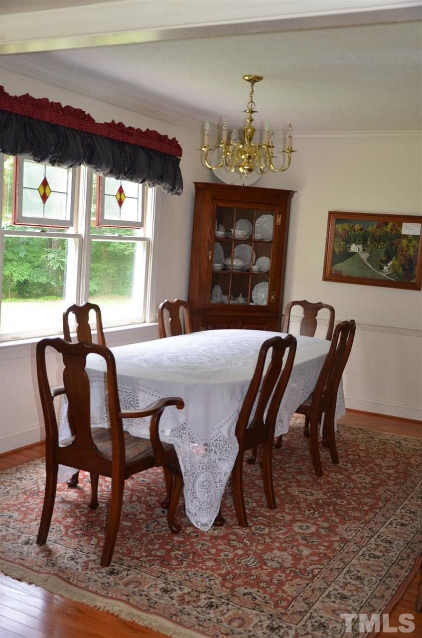 1000 Fate Washington Road Stem, NC 27581 - Photo 12 of 28 a view of a dining room with furniture window and outside view