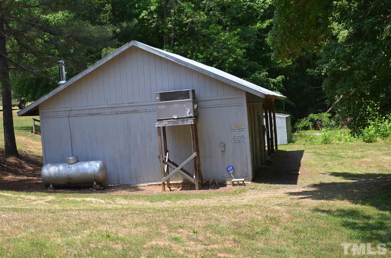 1000 Fate Washington Road Stem, NC 27581 - Photo 15 of 28 a view of a house with backyard and plants