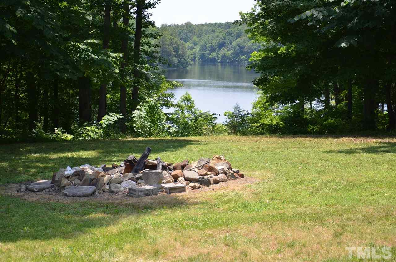 1000 Fate Washington Road Stem, NC 27581 - Photo 4 of 28 a view of a lake with a yard