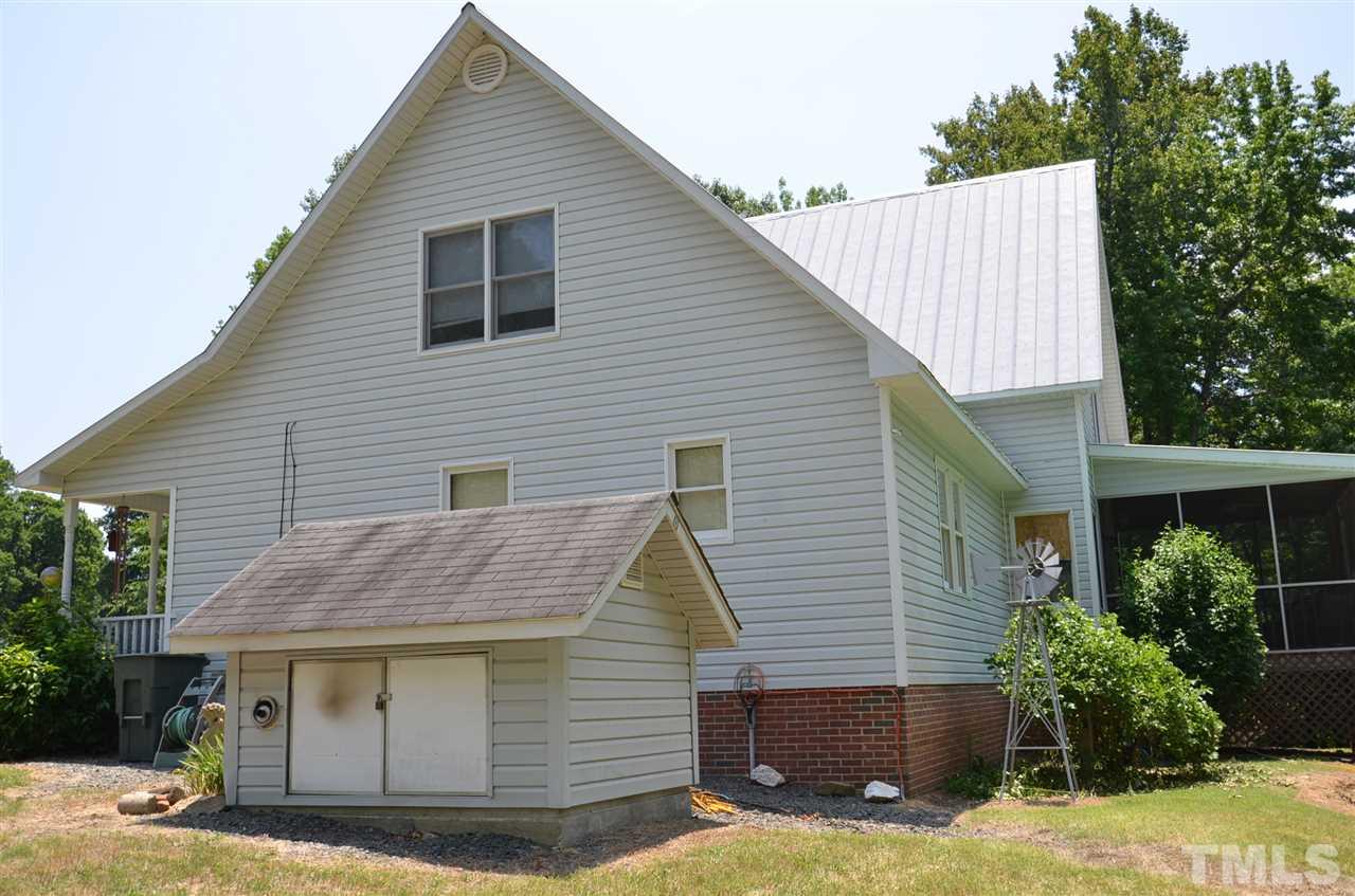 1000 Fate Washington Road Stem, NC 27581 - Photo 5 of 28 a view of house with yard and trees in the background