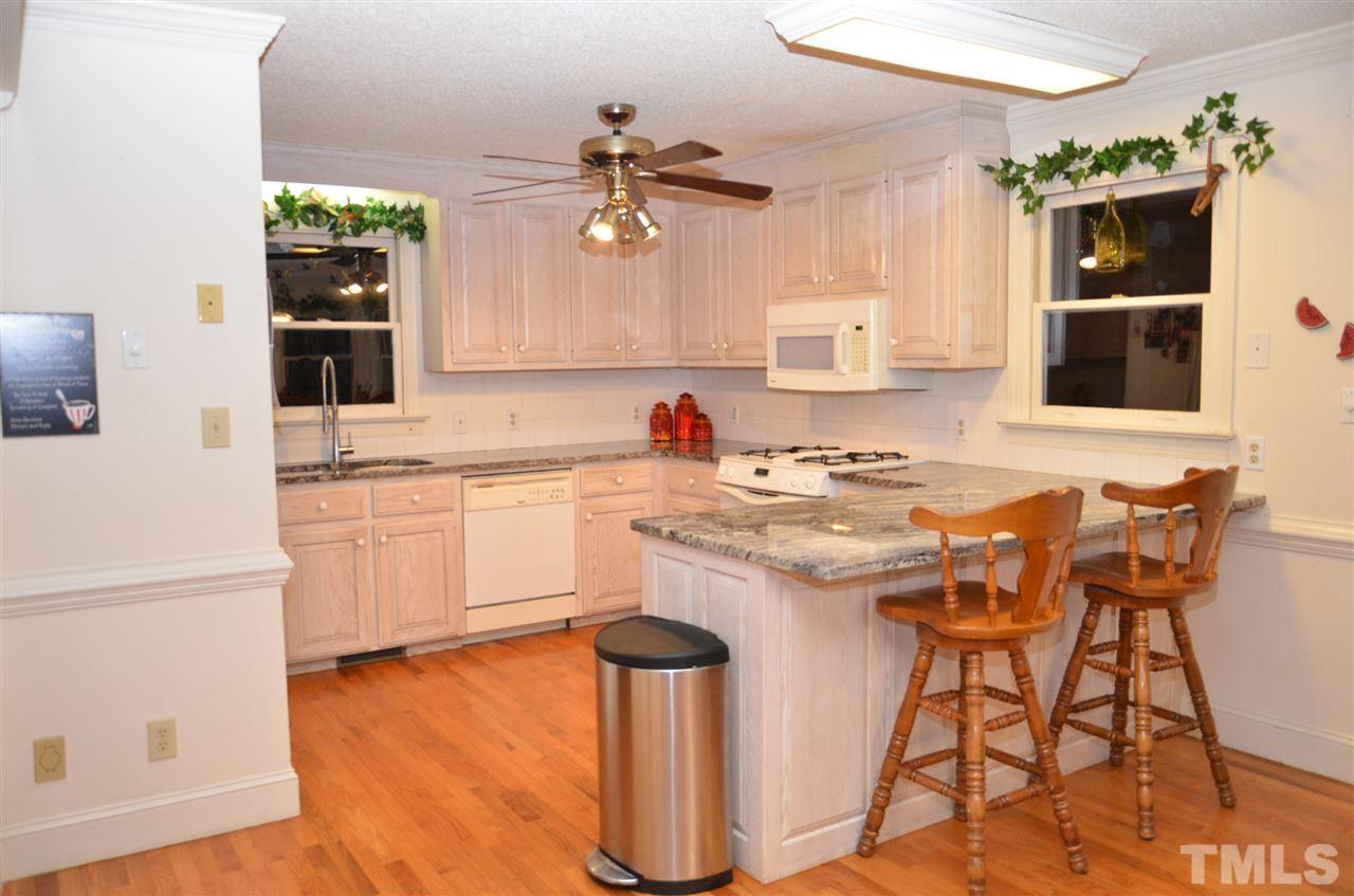 1000 Fate Washington Road Stem, NC 27581 - Photo 10 of 28 a kitchen with a sink cabinets and window
