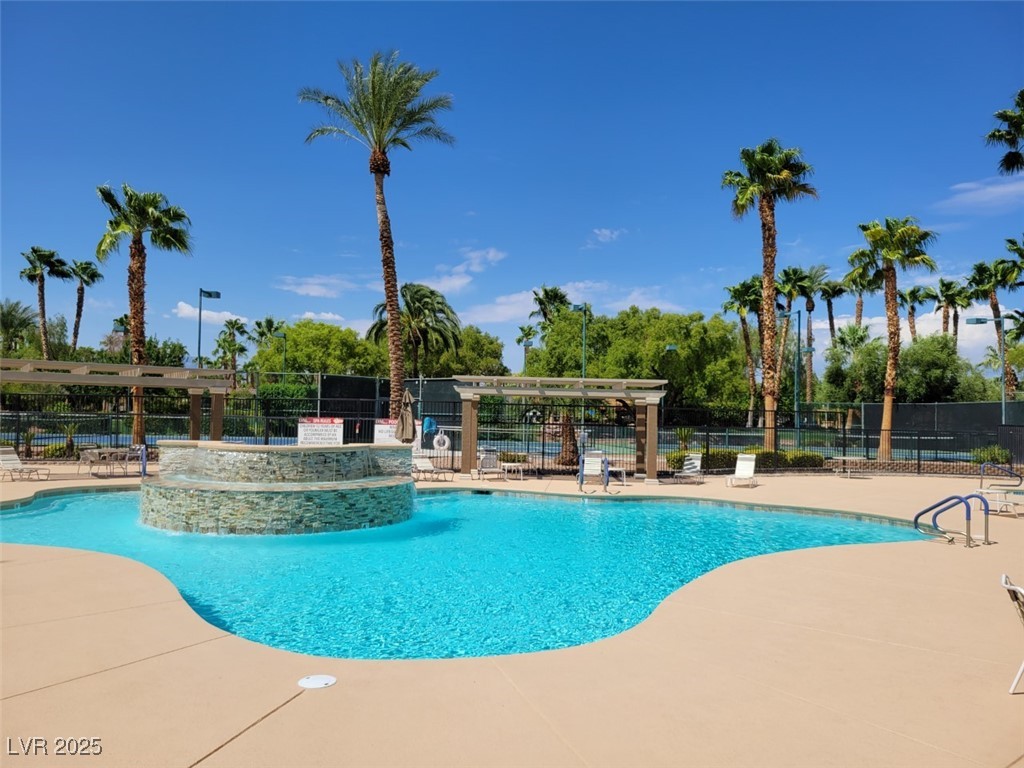 8175 Arville Street, Unit 210 Las Vegas, NV 89139 - Photo 30 of 36 Community pool featuring a patio