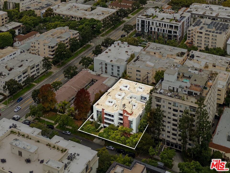 429 North Oakhurst Drive, Unit 203 Beverly Hills, CA 90210 - Photo 20 of 20 a view of a backyard with wooden fence