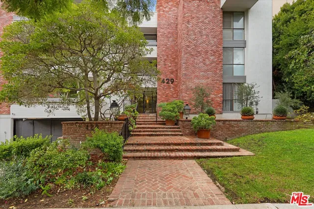 a view of a building with garden