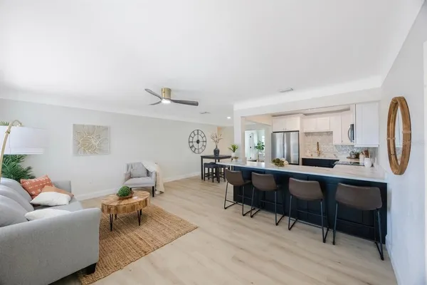 a view of a livingroom with furniture and window