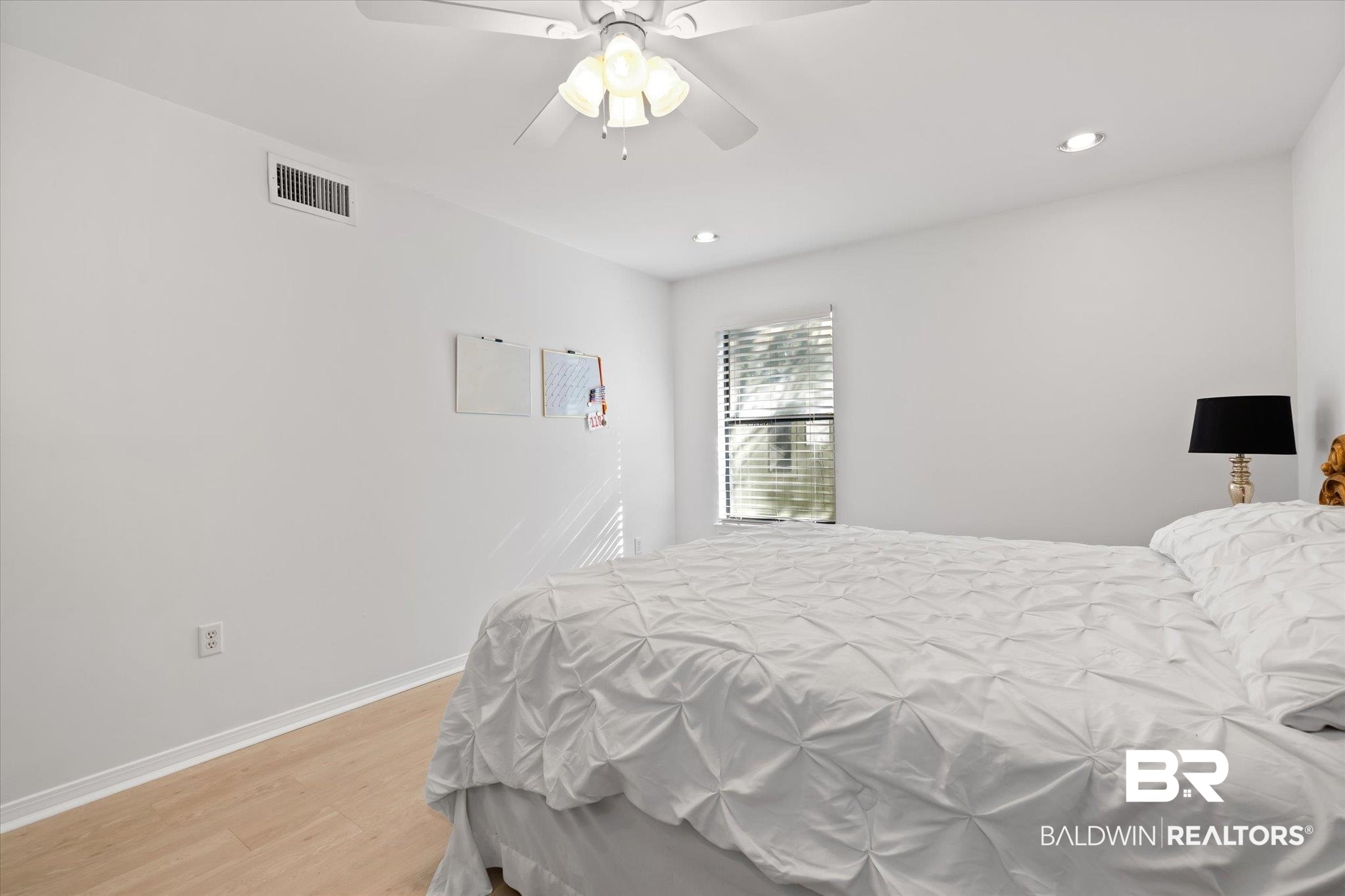 1008 Mcneil Avenue Mobile, AL 36609 - Photo 11 of 20 Bedroom with ceiling fan and wood-type flooring